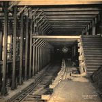 "Subway Construction: 14th Street & 4th Avenue Pillars and tracks; stairs down to platform. October 1903."